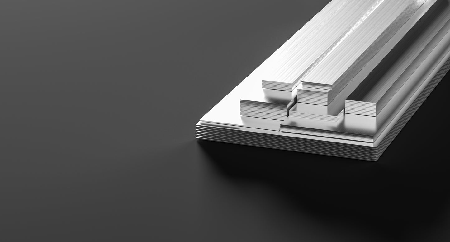 Flat metal bars in various sizes showing the side indicating the thickness of the