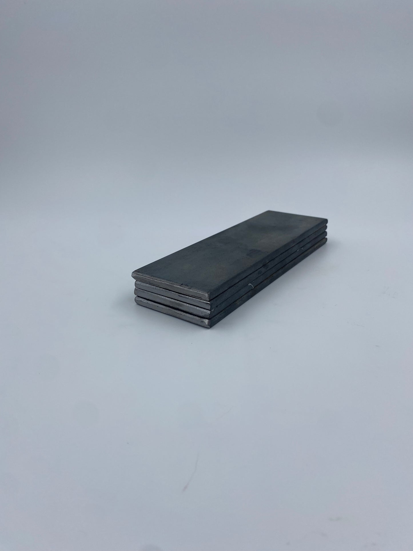 Stack of grade a 36 hot rolled carbon steel plates in the shape of a rectangle