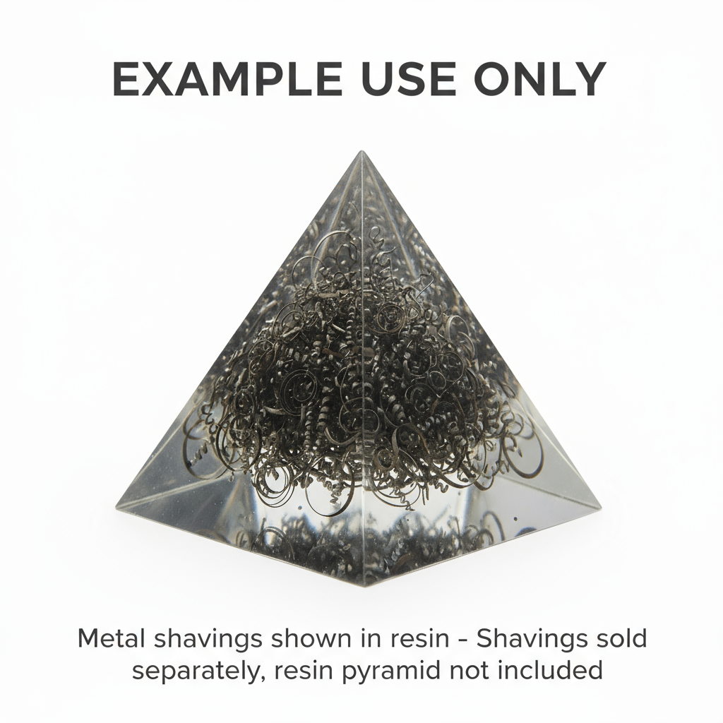 Pyramid-shaped resin display with metal shavings on a white background, labeled 'Example Use Only'.